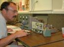 Eddie--KE4PRL racks up points on this classic HW-12. Note the "modern" power supply to his left.
All photos by Luther--KG4USK