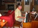 During a break W3HGT keeps his CW rhythm tuned by tickling the ivories!