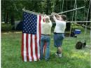 THE BATTERY POWERED RADIO STATION ABOVE USED THE VHF,UHF,6 METER BEAMS BEING ERECTED WITH THE AMERICAN FLAG TOPPING IT OFF..WHAT A NICE ADDITION THIS COMBO MADE TO THE SKYLINE.