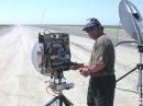 Wayne KH6WZ looking South from the flat lands of the central valley with his 8 watter and a 2 foot dish.