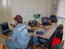 Ron N8MPF to the right on the 910H working a station on CW via the straight key , Dave KC8SCG working some locals on FM .