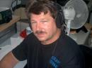 David (K3LP) Sunday morning as the sun is just entering the FS5UQ Station. The photo is called "Blinded By the Light" - a Single Operator without sleep in over 30 hours