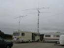 Photo #1 - The station with 144MHz, 432MHz, 902MHz and 1296MHz antennas on the tower and 50MHz on the rear of the RV.