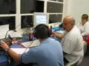 Photo: TARC OPERATING POSITION ONE L-R; Chris-KD5JXL, Rob-WJ5K and Melanie-KD5TDH. This shot was taken in our main operating suite.