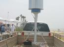 The vertical wind turbine silently charged several batteries scattered thru-out our setup. Supplemented with solar panels, the unit produced more electricity than was being consumed!