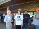 Good fellowship at FD 2006!

Denise Bode, of the Oklahoma Corporation Commission, visits with Allen Watson-W5ERY (Edmond's Radio Youngster) and on the right EARS President Frank Tassone-AA5GI and Ed-KA8NBG

Visting was a bit brief 'cause the BBQ was ready to eat!