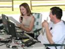 <i>Robin Baer of Channel 27 News on the air as GOTA Coach John Decotaeu KG4GXT looks on</i>