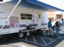 Some of our dedicated club members who just completed set-up of the displays on the outside of the trailer and are awaiting the beginning of operating event itself.