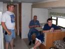 Scott-KC0BHE, Cleyon-AD6P, and Nick, aspiring ham-to-be keep cool in the Command Trailer. There is a door to the radio room, in case the visits get noisy, but that was never the case this year.