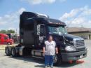 Me with my company truck.  HF mobile operating is a lot of fun with this much time behind the wheel.