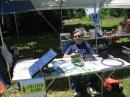 Nick, W8XD, on 40 meters cw, FT817 and solar panel.  The sun really does shine in Cleveland on Field Day!