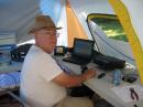 Bill W8JGU at the controls of the 6 meter station.