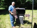 Chef Dwaine, K8ME, with his all important gas grill! Even field day operators need to eat!