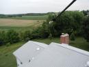 Tower view down the 80M dipole (no the tractor is not pulling it up)
