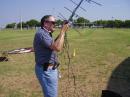 Despite that tangled mess of wires, Bob Best KA4JSQ was able to work our satellite contacts with his handheld antenna.