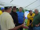 Town Fire Marshal and Emergency Manager Gil Hanse (Leather hat and slicker) stops by to check out this year's Field Day operations.  Don, W2EUL; Dan, WB2COO, Gil Hanse, Walter, KA2RGI; Bob, KC2PWH; Frank, K2LI.