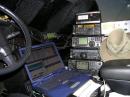 The "heap" of equipment as seen roughly from the Operators Position, with the logging laptop pulling double time on WSJT Duty ....