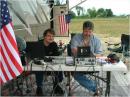 First time Field Day operator John, KD8FXV, learns the ropes from Gary, K8EHB.