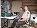 Sgt Matt Elsberry, Brooks County Sherif Dept, with Chris Tone, N4BIM at the 40 meter SSB station.