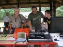 Lt. Mike Coldiron, KD0AIZ, Howell County Sheriff's Department shows emergency radios for fire, police and sheriff.