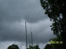 The club's Hy-Gain beam, HF vertical and Yagi.  The dark clouds in the background turned into a thunderstorm later in the day.