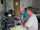 Club President Prof. John Gibson (N08V) and Bill Rogers (KC8OUF) operating station 1.
