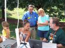 Young Operator at GOTA station as Proud Grandparents look on

Ryan, Mackenzie Mooney, Dewey Cook, KJ4BYU (ARRL PIO and Cleve. Co. EM), Lynn Cook and Ben Melvin, KM4C (Emergency Coordinator)
