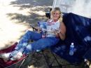 Bev Kester   KG6EFD waiting for her turn on the HF rig.  Reading QST.  She stacked up 79 qso's within a couple hours on 40 meters.  


