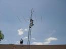 Bill KC2CNB putting the final touches on the VHF tower and antennae, the 6m loop at top is used when the band is hoppint as move the beam takes too much time !