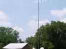 Reil Sloan (KI4NDF) with assistance from Stanley Swafford (KI4NUG) installing the VHF antenna