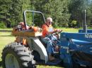 Joe, N7YPS, our Field Day host for 2006, as in past years, operates tractor used to raise tower.